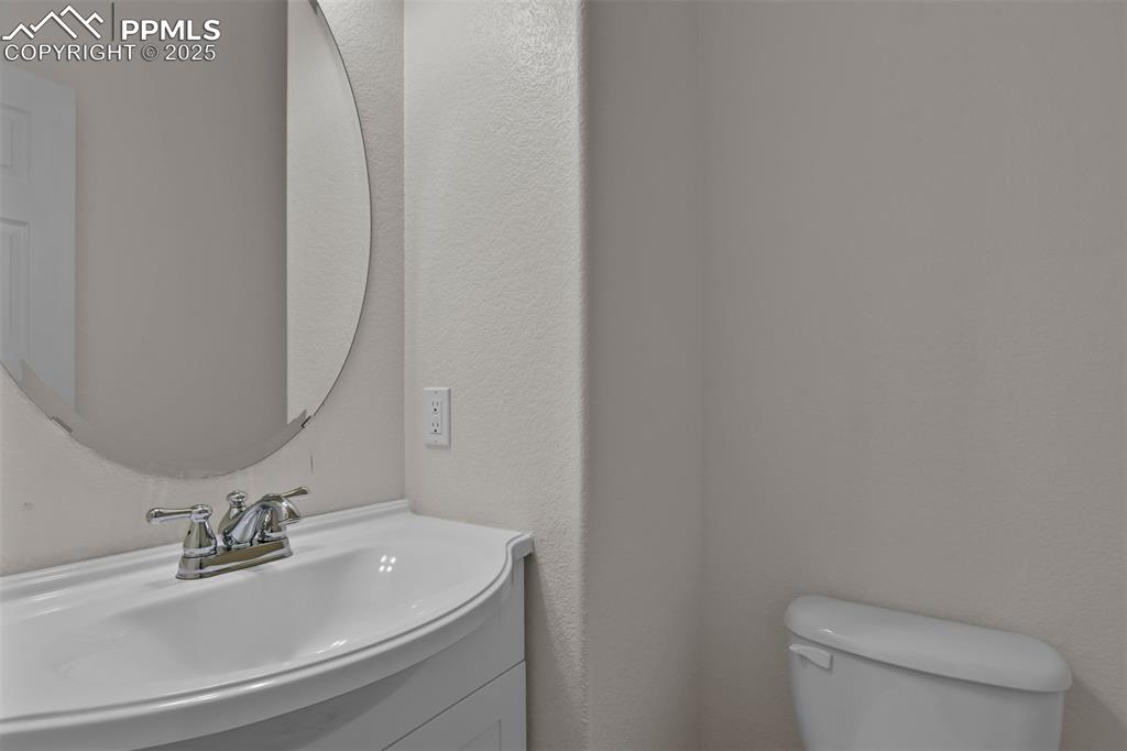 Image 17 of 38: Main level bathroom with vanity