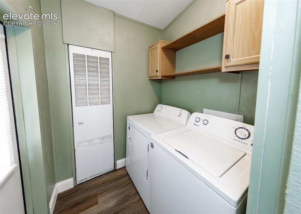 Image 15 of 26: Laundry room and exit to the back yard