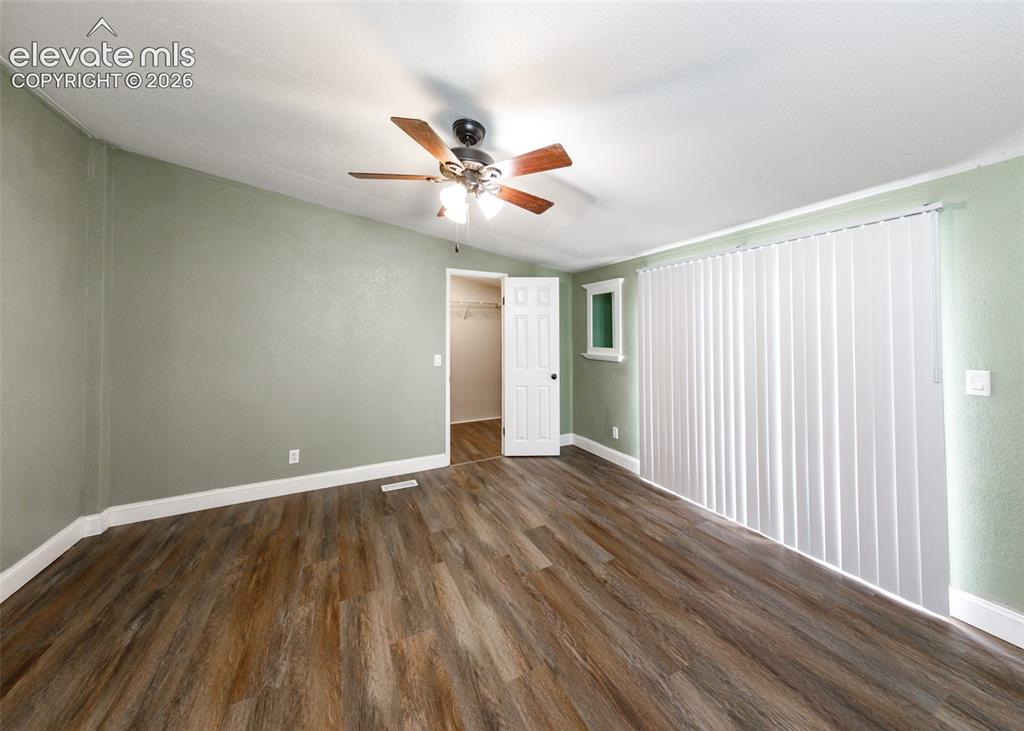 Image 16 of 26: Master bedroom