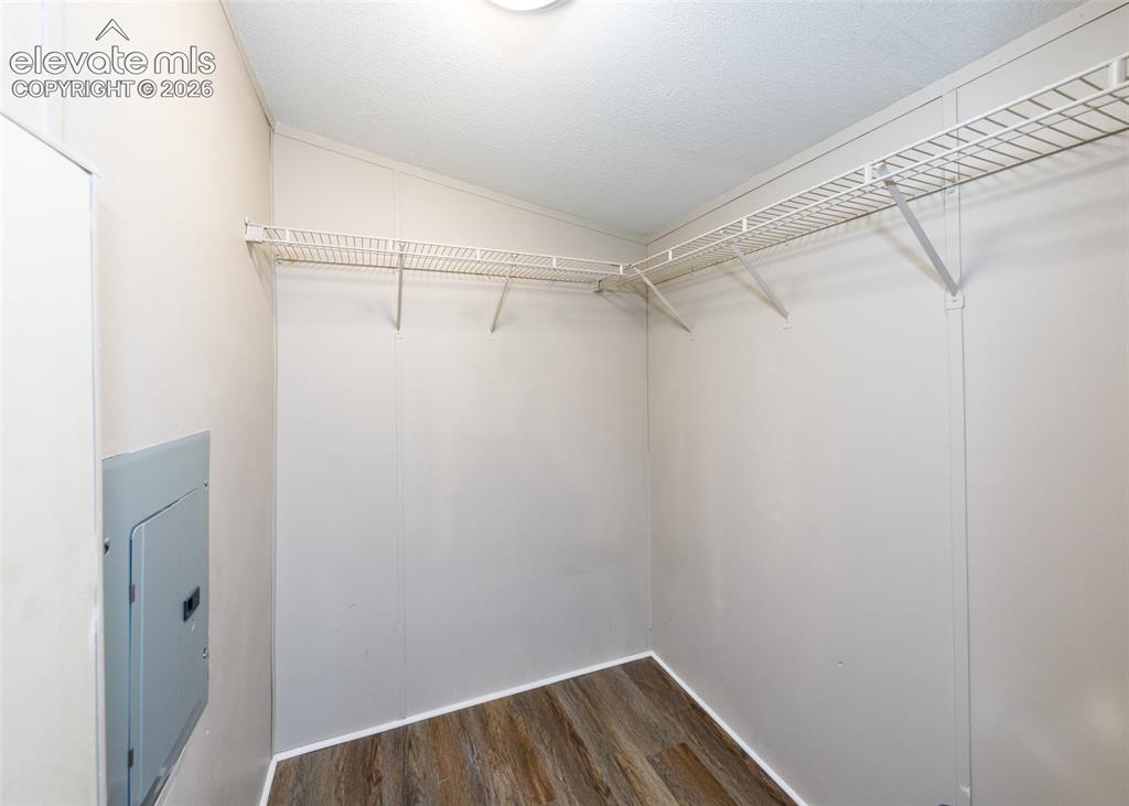 Image 18 of 26: Master bedroom with walk in closet