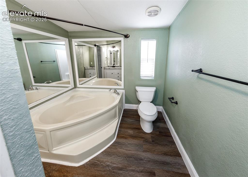 Image 19 of 26: Master bathroom