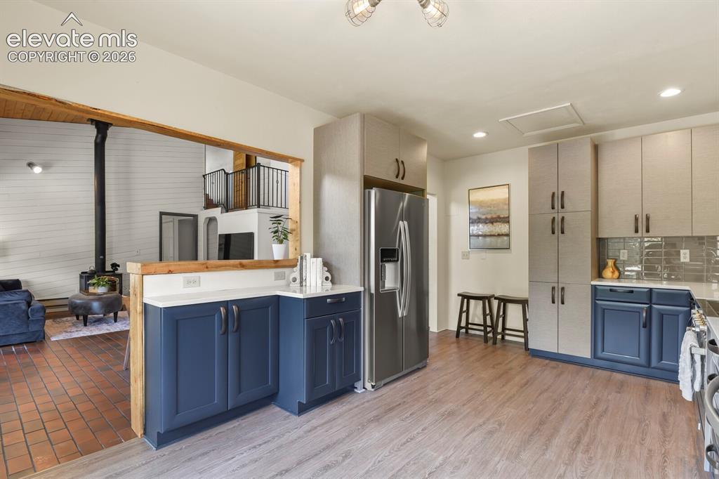 Image 14 of 49: Beautifully remodeled kitchen with premium finishes.
