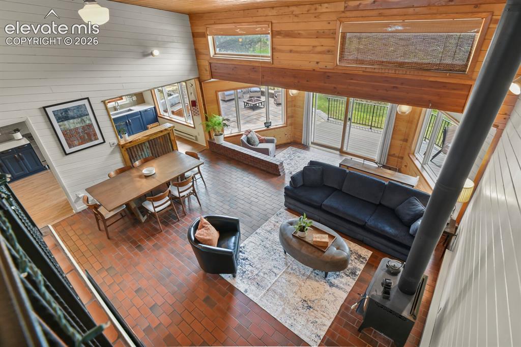Image 19 of 49: Expansive windows bring the beauty of the outdoors inside.