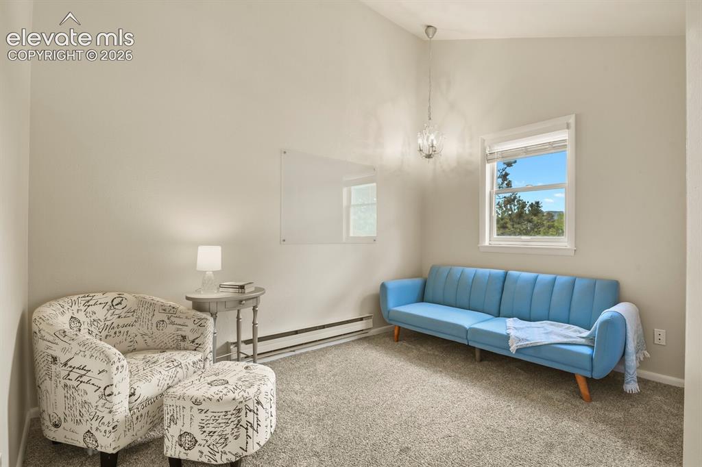 Image 26 of 49: Versatile bedroom ideal for family, guests, or hobbies.