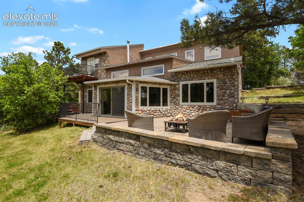 Image 33 of 49: Rear elevation showcasing the home