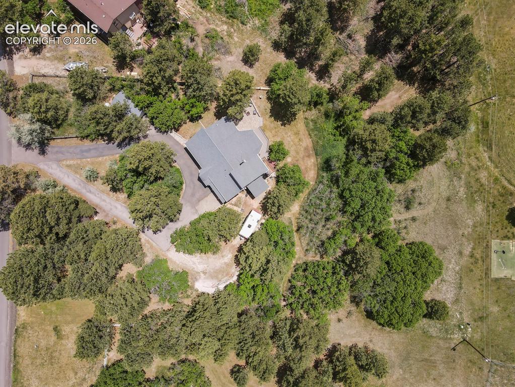 Image 43 of 49: Aerial perspective showcasing the home
