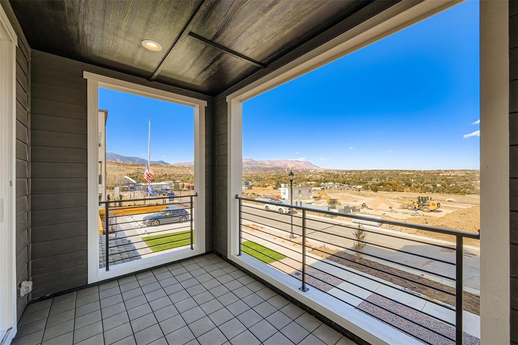 Image 12 of 13: Balcony with a mountain view