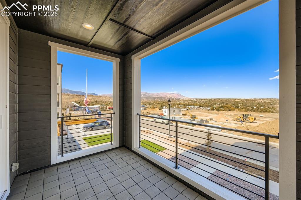 Image 19 of 21: Balcony with a mountain view