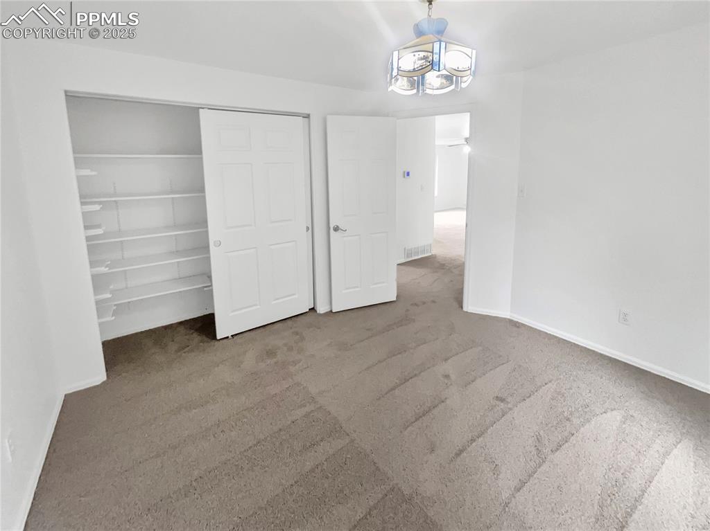 Image 14 of 23: Bedroom