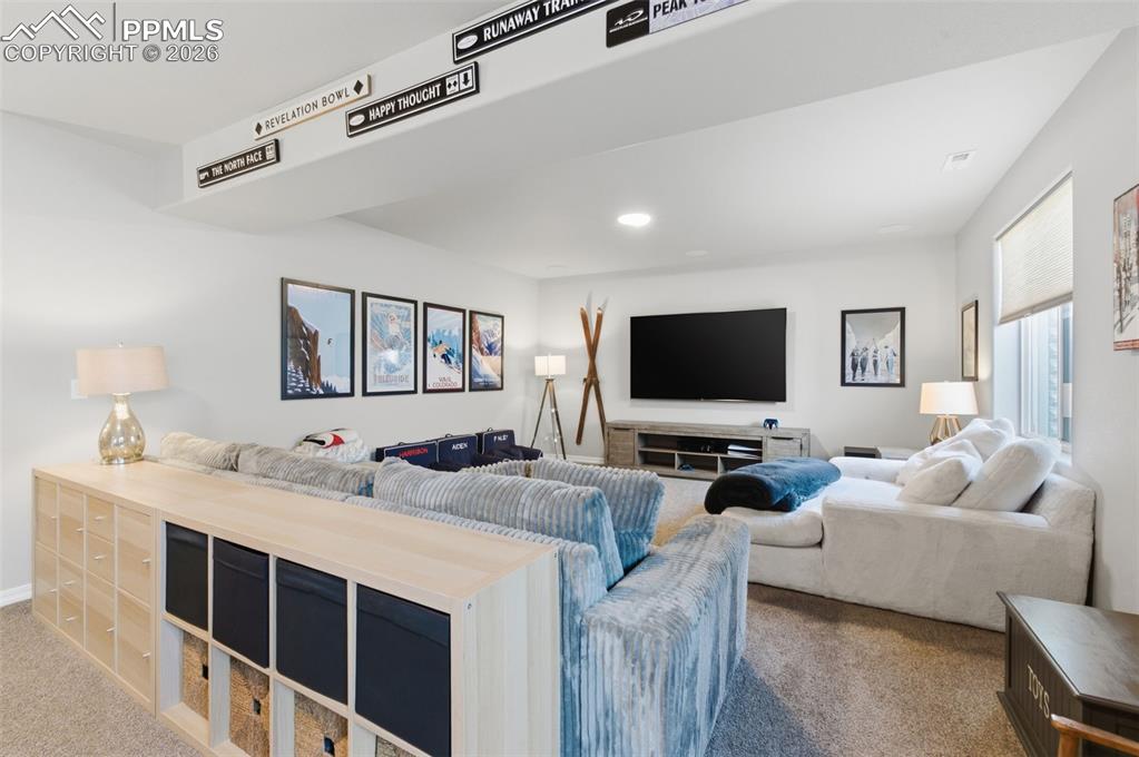 Image 24 of 44: Lower Level Is Carpeted Except For The Bathroom & Utility Rm