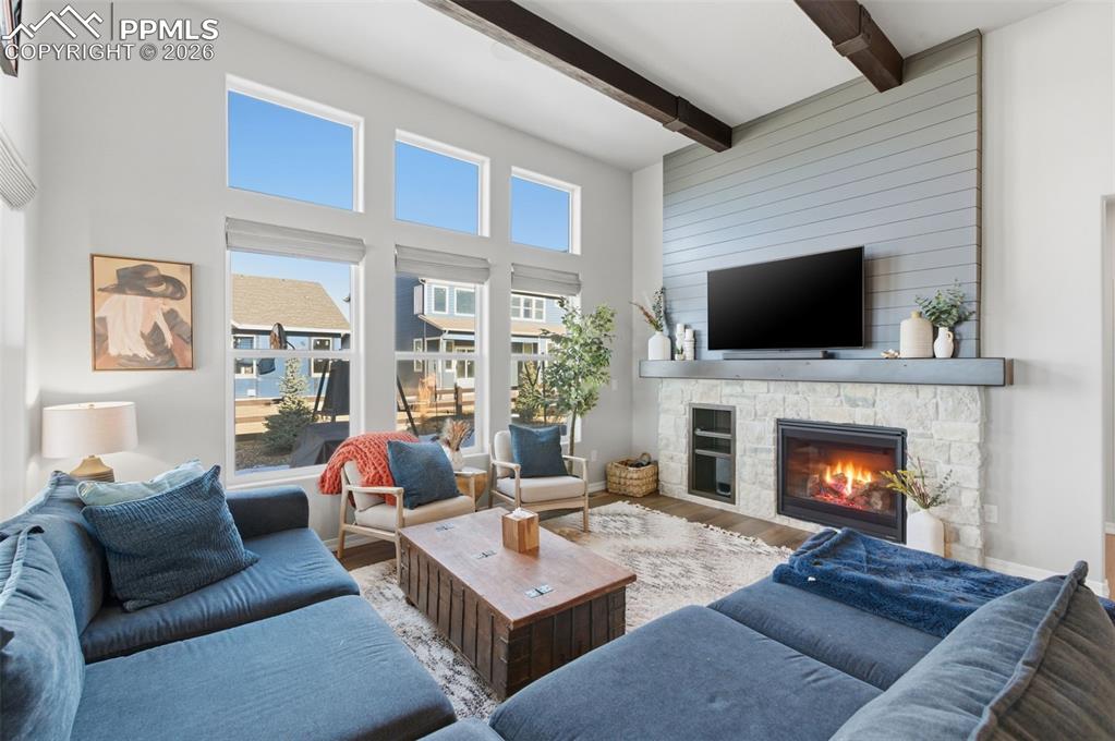 Image 5 of 44: Stone Surrounded Gas Fireplace!