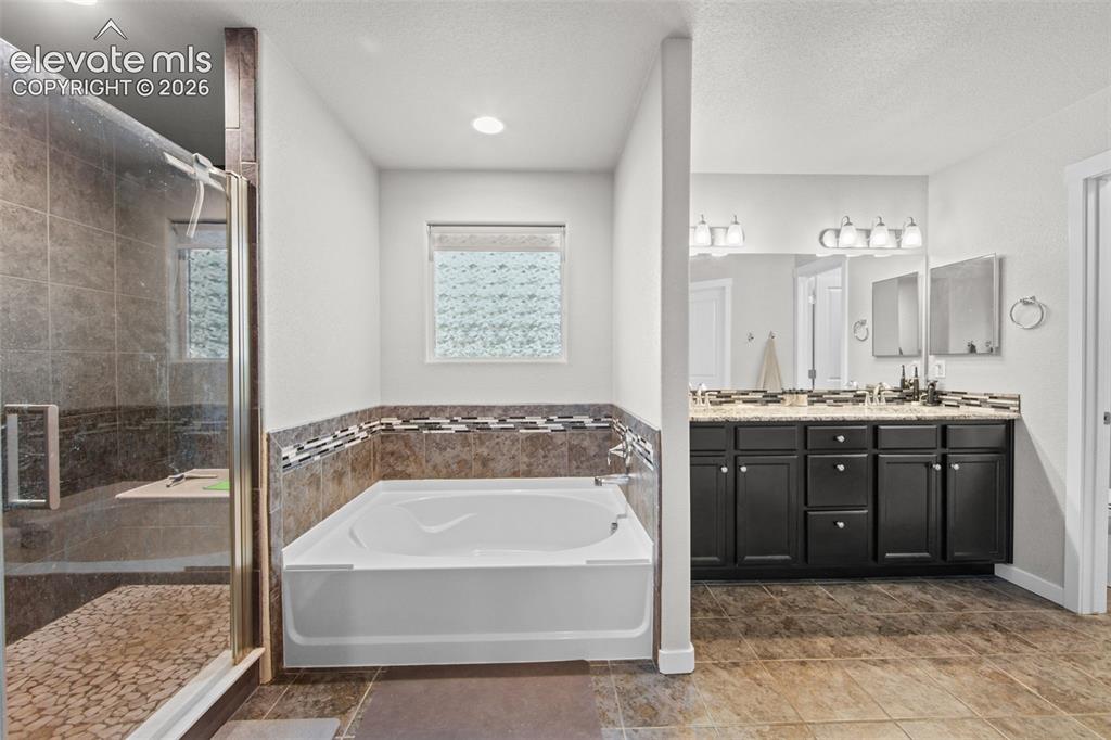 Image 5 of 39: Master Bathroom