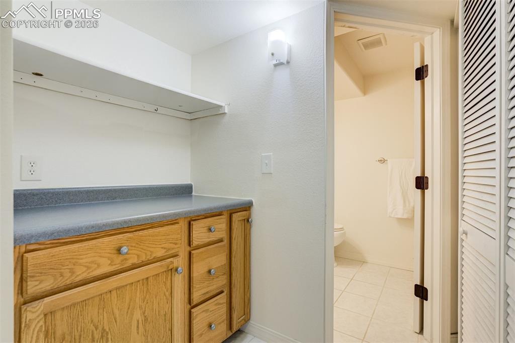 Image 34 of 46: Kitchenette area in the basement. 