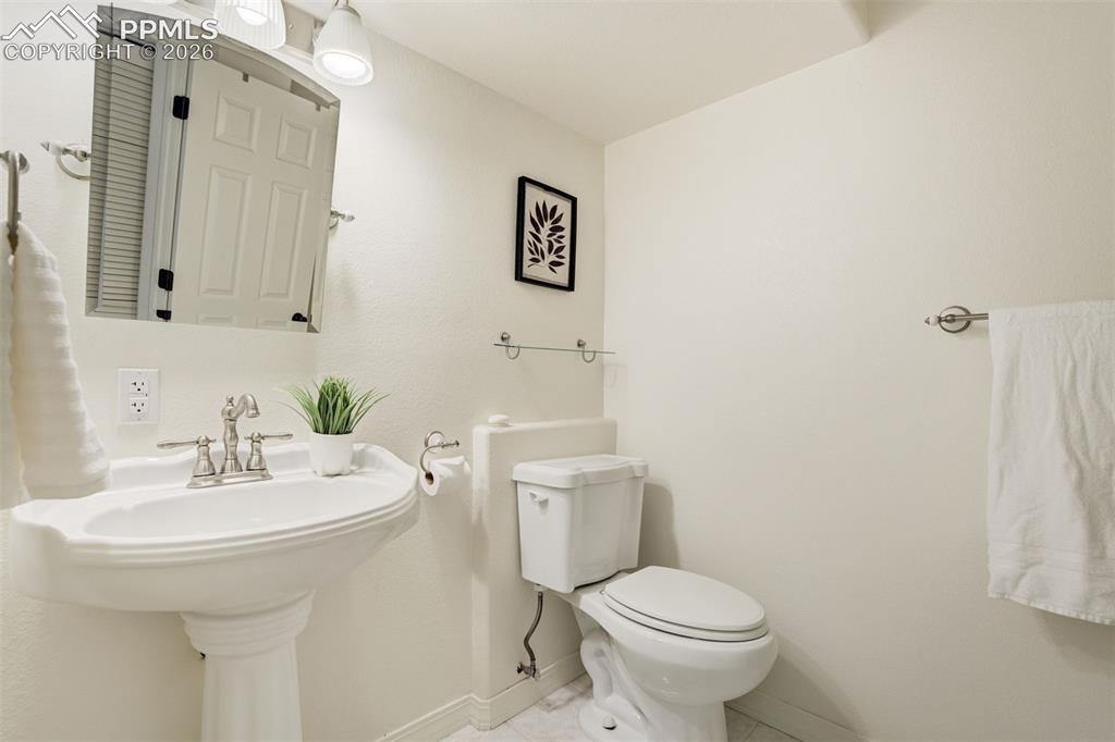 Image 35 of 46: Bathroom in the basement is pre-plumbed to add a shower. 