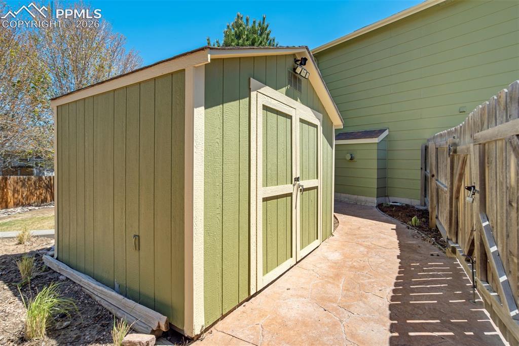 Image 41 of 46: This shed says, "yes, you can own more tools." 
