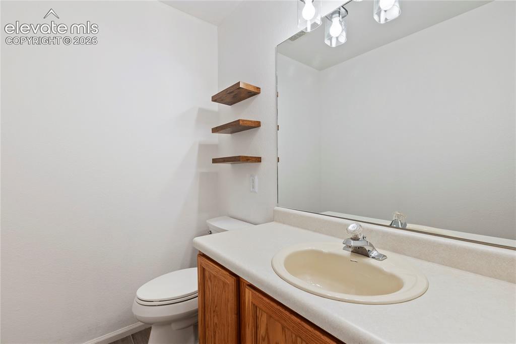 Image 22 of 48: Downstairs bathroom.