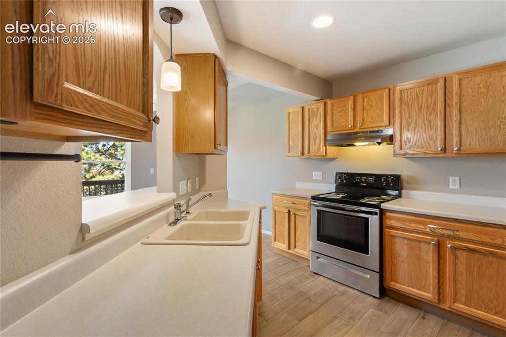 Image 23 of 48: Open kitchen floor plan. Recessed lighting. 