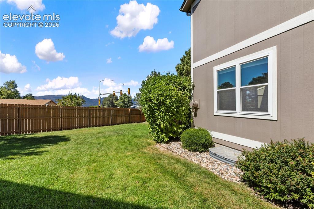 Image 46 of 48: Back yard area. 