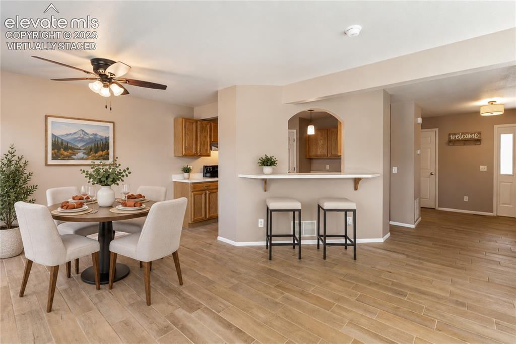 Image 5 of 48: Virtually Staged-Looking towards kitchen.
