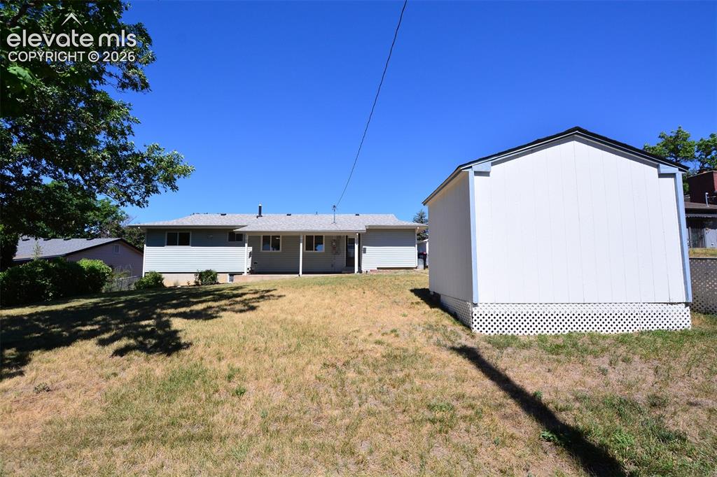 Image 18 of 21: Back of home