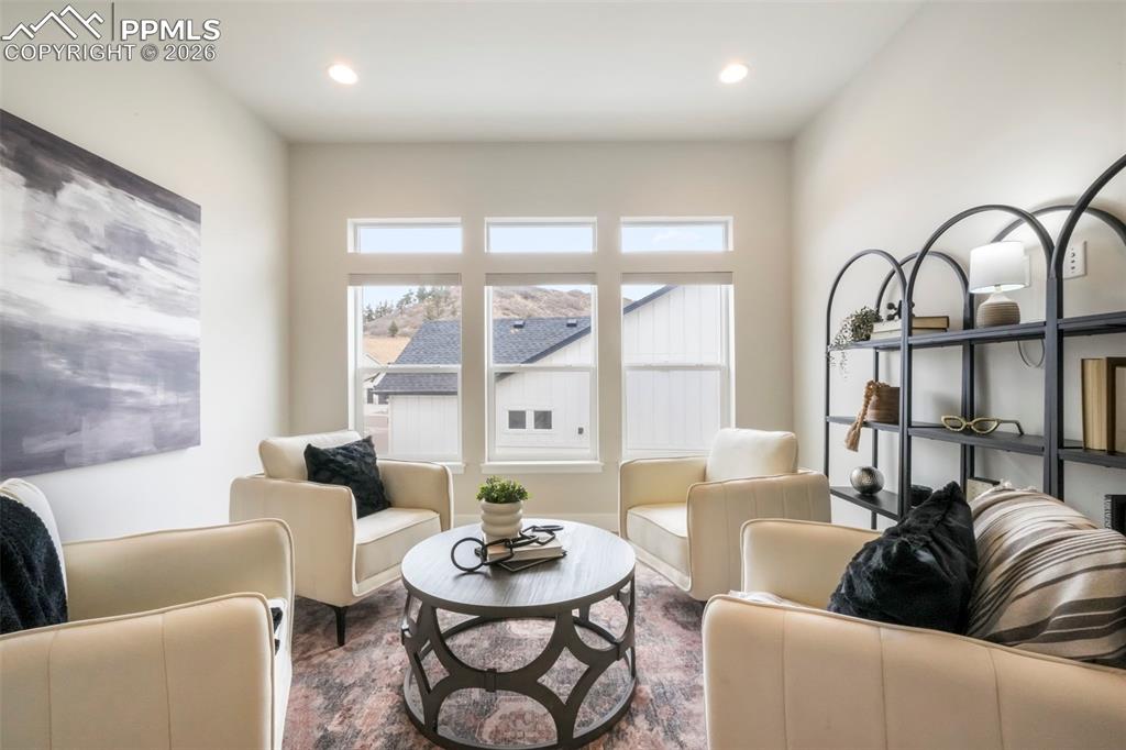 Image 7 of 50: Used As A Library, could be formal dining, office with french doors.