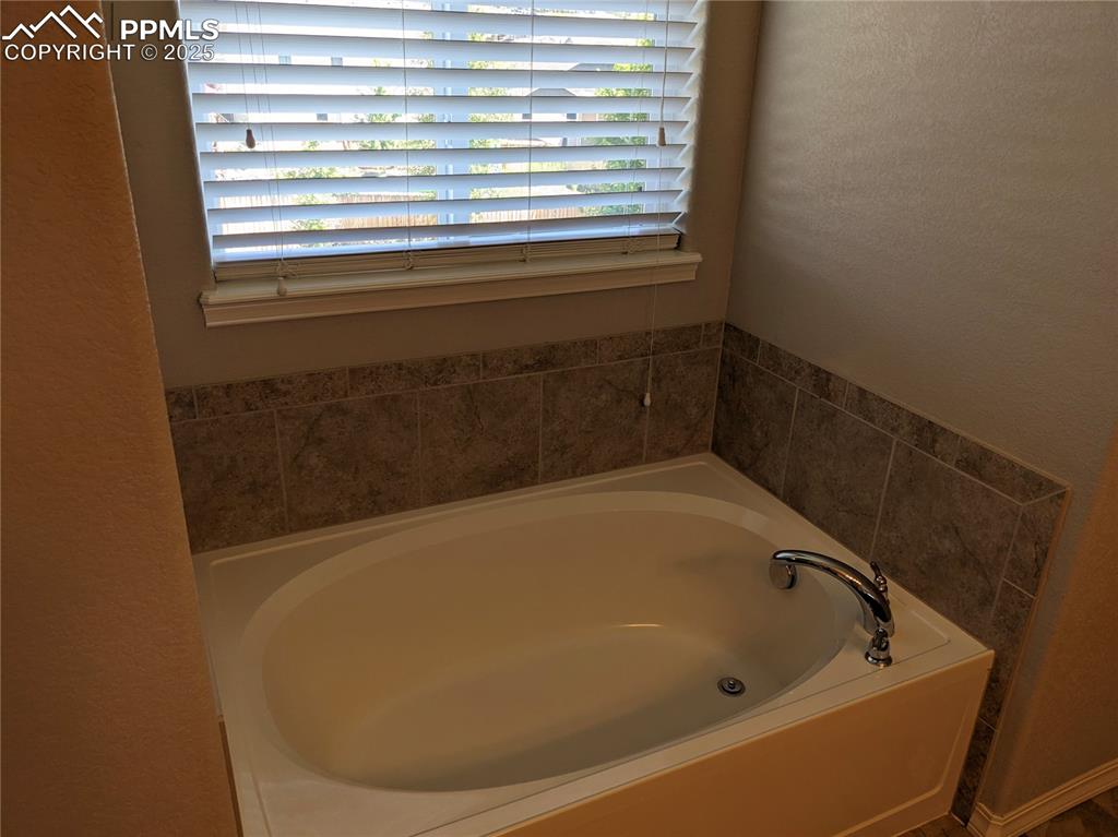 Image 13 of 30: Master Bathroom