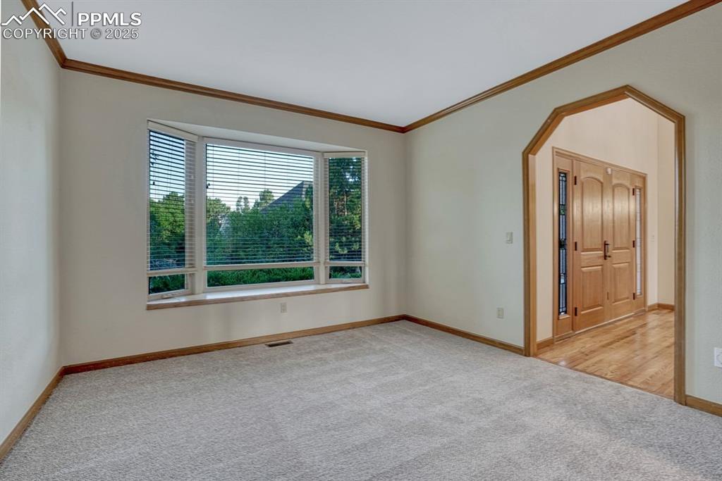 Image 10 of 43: This front room has a variety of ways it could be used. Make it your own!