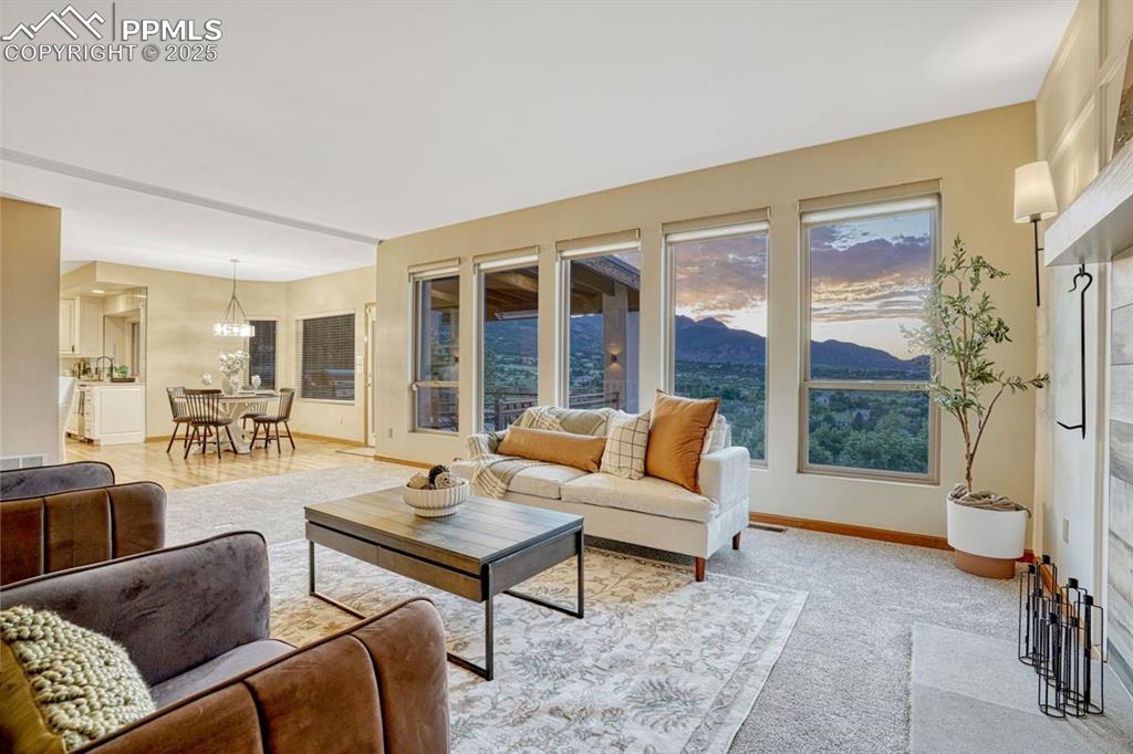 Image 3 of 43: Expansive windows let you take in the views, from the mountains to the city
