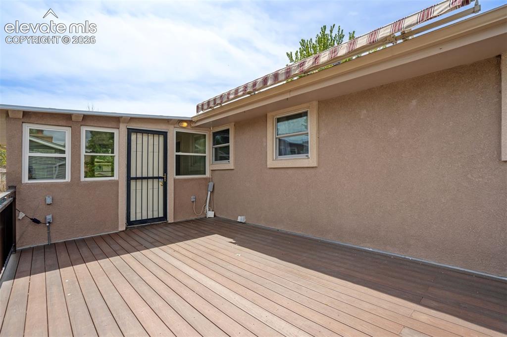Image 20 of 50: Composit Deck is off the SunRoom