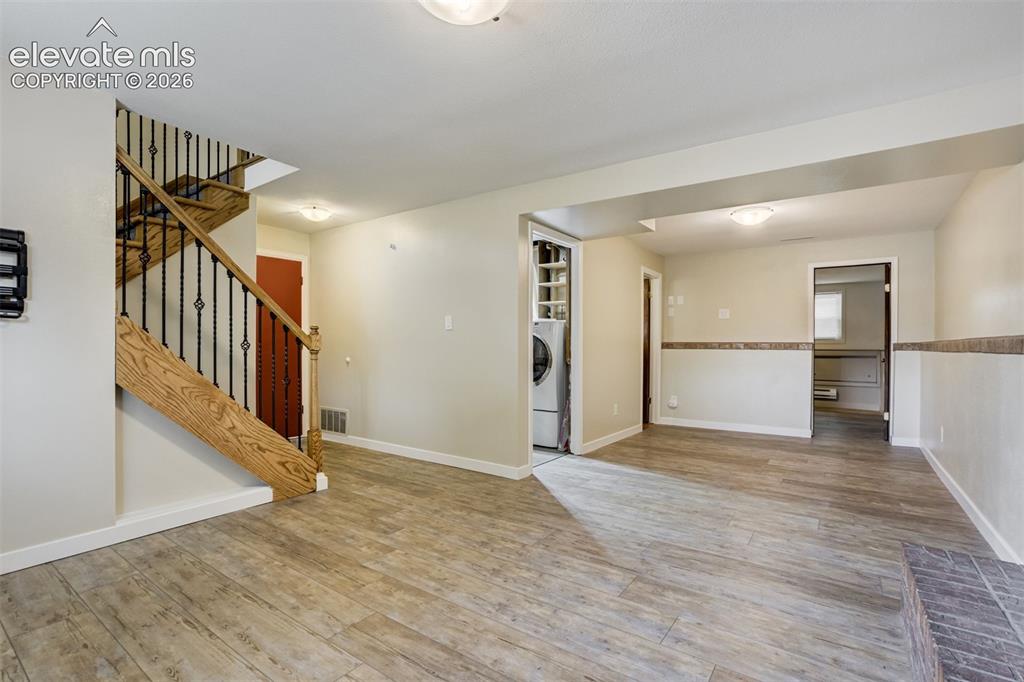 Image 21 of 50: Basement with Luxury Vinyl flooring