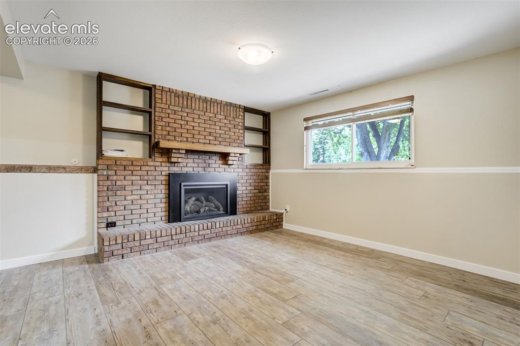 Image 22 of 50: Natural Sunlight in basement with the Garden Level Windows