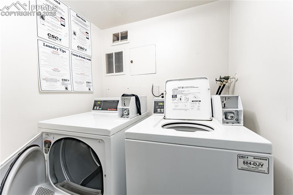 Image 16 of 19: On-site coin operated washer and dryer