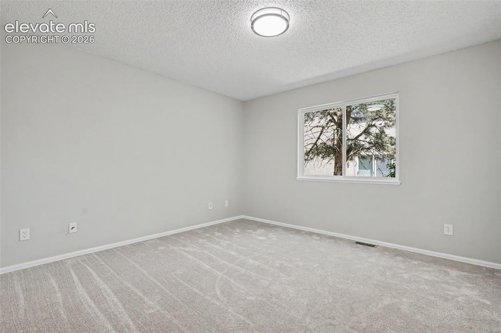 Image 11 of 28: Main level bedroom!