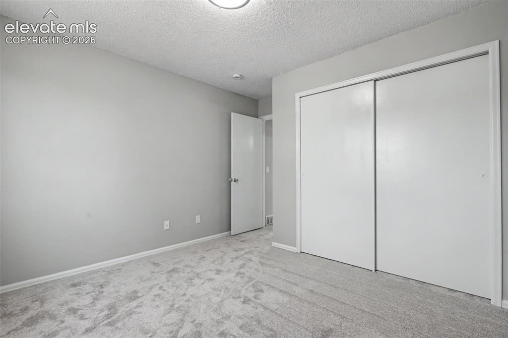 Image 15 of 28: Bedroom