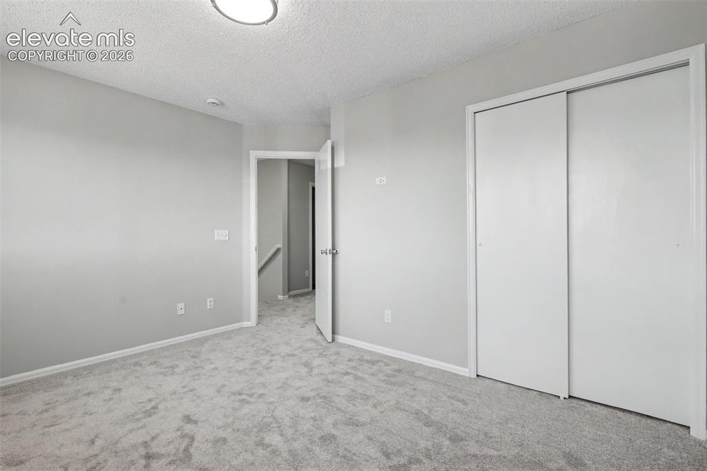 Image 22 of 28: Master Bedroom
