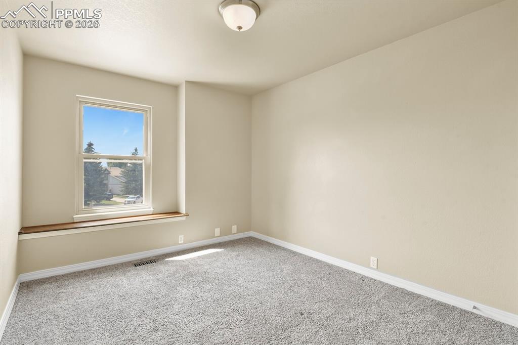 Image 23 of 43: Bedroom