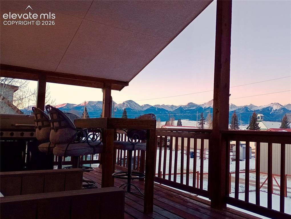 Image 9 of 12: Covered outdoor deck