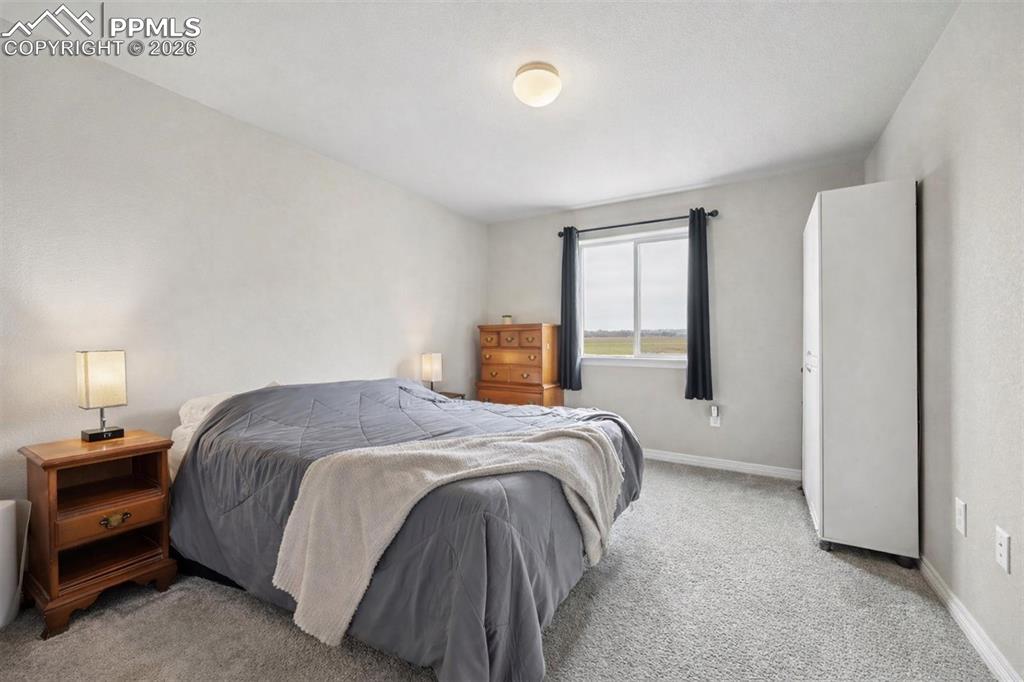 Image 20 of 38: Bedroom