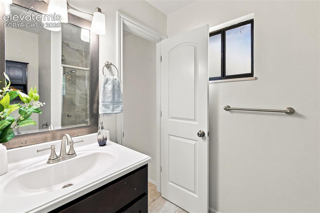 Image 31 of 46: Primary bath - main level