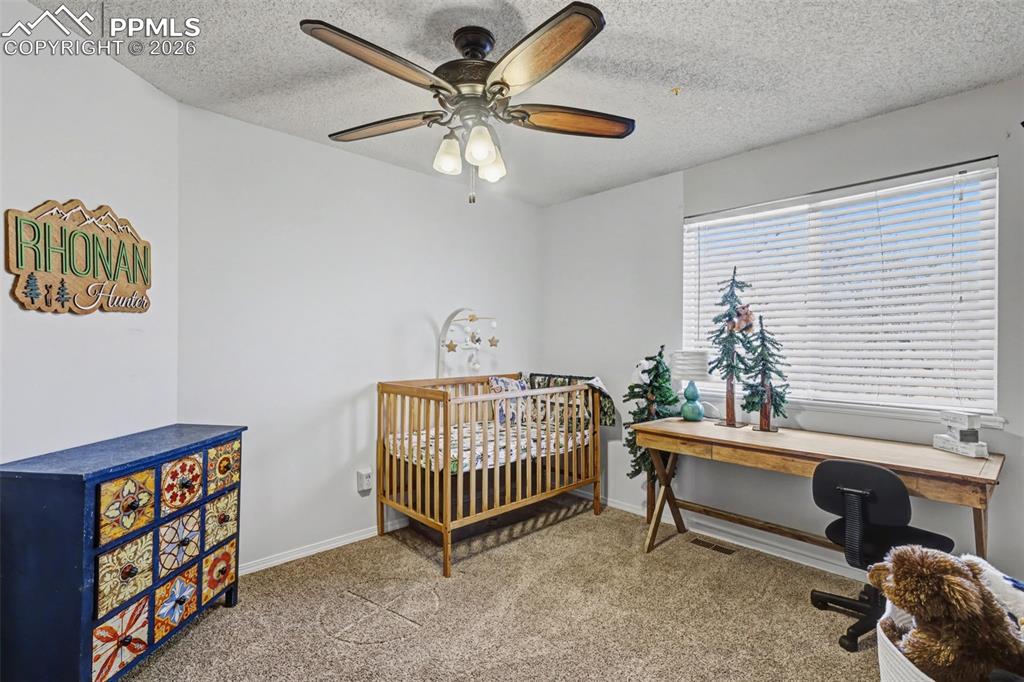 Image 15 of 28: Bedroom