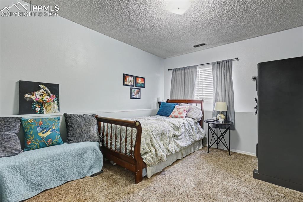 Image 17 of 28: Bedroom