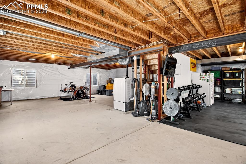 Image 26 of 36: Unfinished basement with potential to customize as you wish