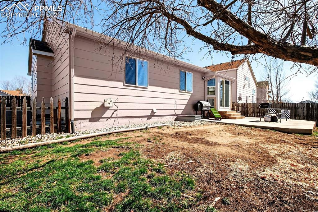 Image 28 of 36: Fully fenced backyard