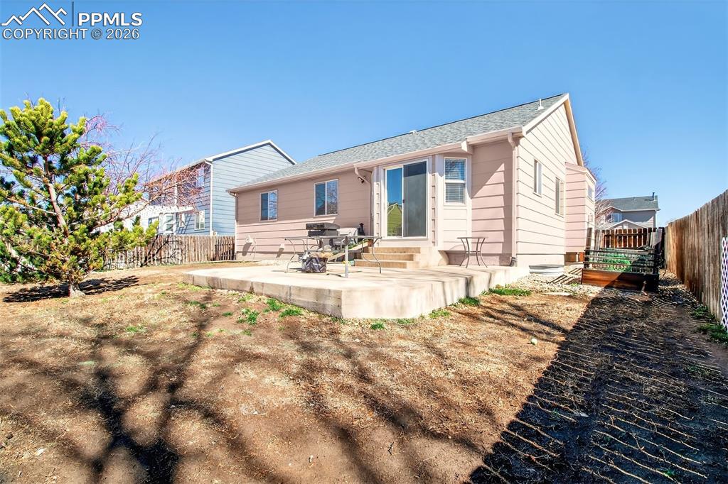 Image 30 of 36: Fully fenced backyard