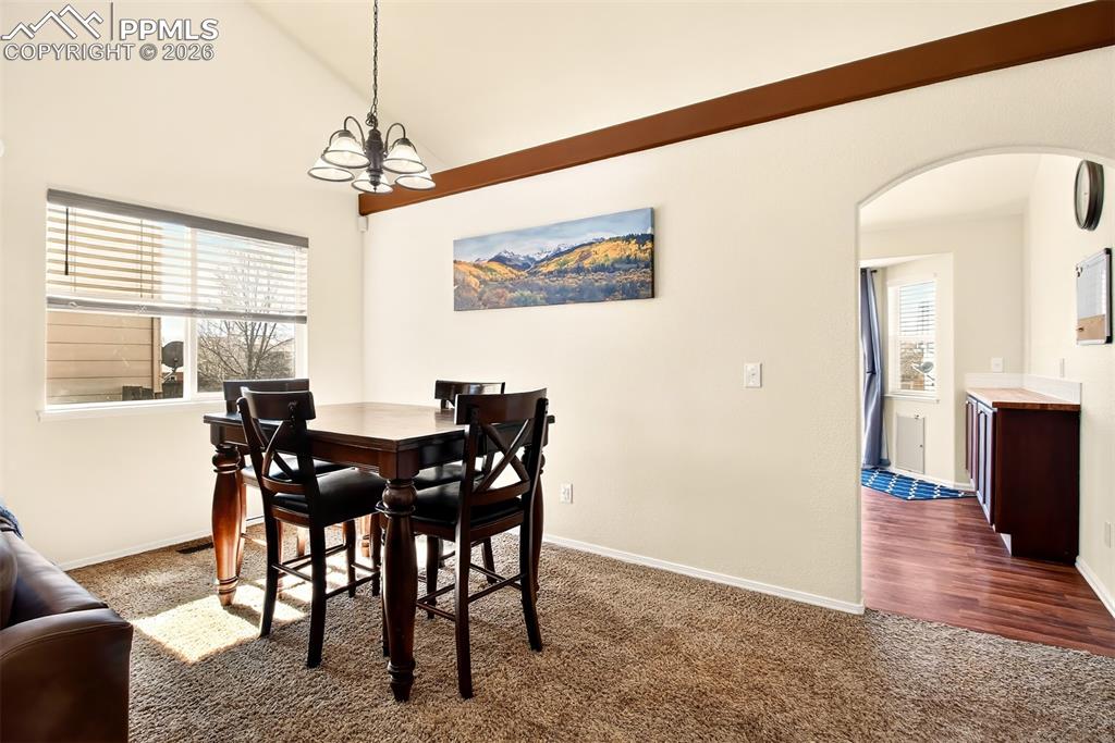 Image 7 of 36: Dining room going into kitchen