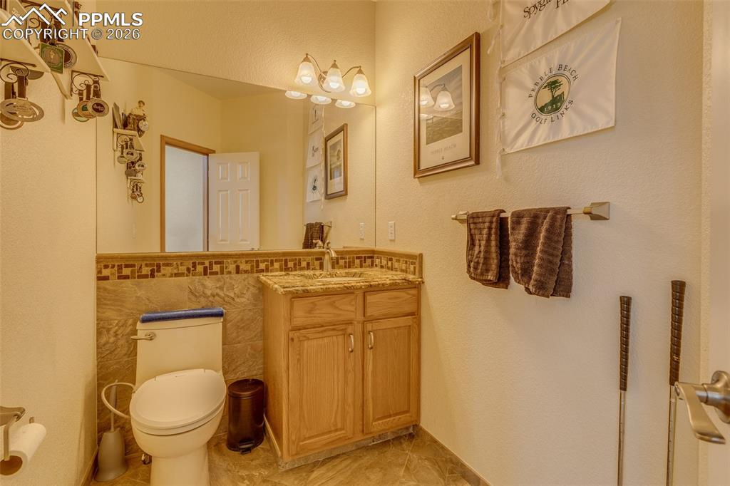 Image 22 of 48: Main level guest bathroom 