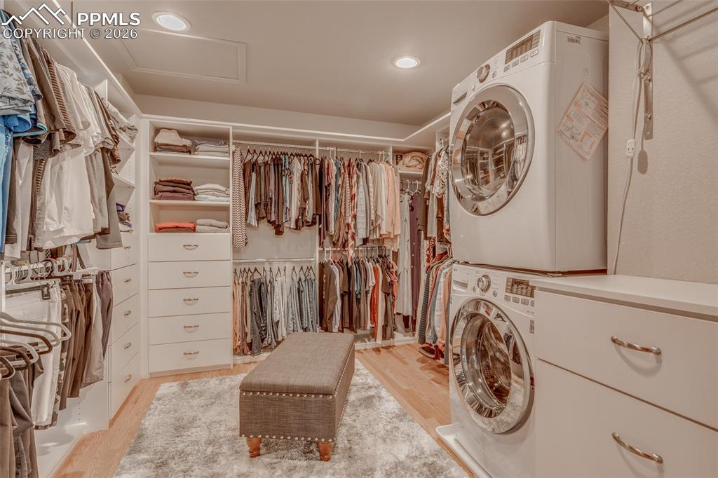 Image 28 of 48: Master bedroom closet/laundry 
