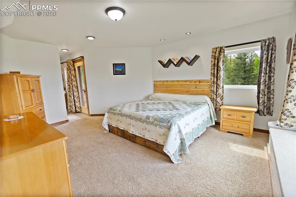 Image 15 of 39: Upper Level Master Bedroom