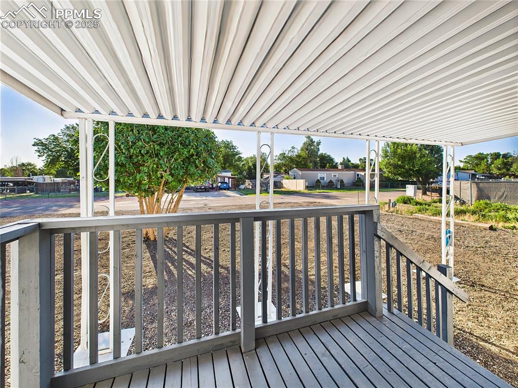 Image 38 of 43: Covered Porch 