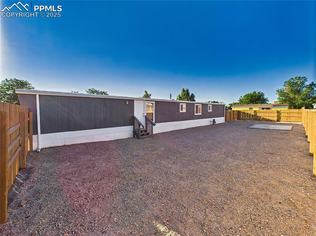 Image 40 of 43: Backyard – Rear Entry View 